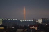 Three Russian rockets launched against Ukraine from Russia's Belgorod region are seen at dawn in Kharkiv, Ukraine, on March 9, 2023. (AP Photo/Vadim Belikov)