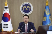South Korean President Yoon Suk Yeol speaks during a Cabinet meeting at the presidential office in Seoul, South Korea, on March 7, 2023. (Im Hun-jung/Yonhap via AP)