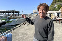 Masaki Nishide, a fisherman at the Saikazaki port, describes the explosion scene Sunday April 16, 2023 at an election campaign event Prime Minister Fumio Kishida attended and narrowly escaped in the city of Wakayama. (AP Photo/Johnson Lai)