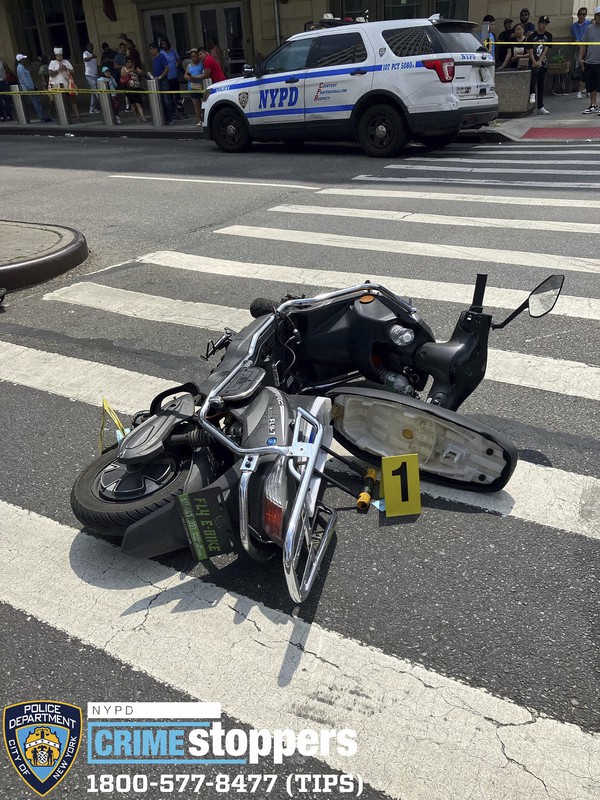 Gunman on scooter shoots randomly in NYC, police say, killing an 87