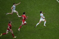 Argentina's Nicolas Sanchez sprints to score a try during the Rugby World Cup quarterfinal match between Wales and Argentina at the Stade de Marseille in Marseille, France, Saturday, Oct. 14, 2023. (AP Photo/Daniel Cole)