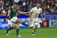 South Africa's Handre Pollard kicks the ball during the Rugby World Cup semifinal match between England and South Africa at the Stade de France in Saint-Denis, near Paris, on Oct. 21, 2023. (AP Photo/Aurelien Morissard)