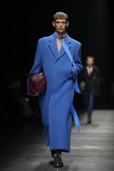 A model wears a creation as part of the men's Gucci Fall-Winter 2024-2025 collection, that was presented in Milan, Italy, on Jan. 12, 2024. (AP Photo/Luca Bruno).