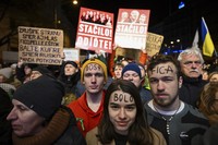 People gather to take part in a protest against a government plan to amend the penal code in Bratislava, Slovakia, on Jan. 25, 2024. (Pavol Zachar/TASR via AP)