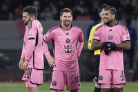 Inter Miami's Lionel Messi, center, reacts with teammates during a penalty shootout at the friendly soccer match between Vissel Kobe and Inter Miami CF at the National Stadium, on Feb. 7, 2024, in Tokyo, Japan. (AP Photo/Eugene Hoshiko)
