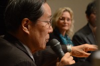 Masao Tomonaga, foreground, speaks during a roundtable discussion as ICAN Executive Director Melissa Parke, background center, and others listen, in the city of Nagasaki on Jan. 21, 2024. (Mainichi/Takehiro Higuchi)