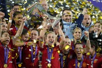 Spain's Alexia Putellas lifts the trophy after winning the Women's Nations League final soccer match between Spain and France at La Cartuja stadium in Seville, Spain, on Feb. 28, 2024. Spain won 2-0. (AP Photo/Jose Breton)