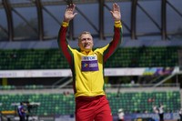 Silver medalist Mykolas Alekna, of Lithuania, celebrates during a medal ceremony for the discus throw at the World Athletics Championships, July 20, 2022, in Eugene, Ore. (AP Photo/Ashley Landis, File)