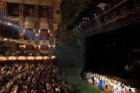 Cast members of the stage production of "Spirited Away," bottom right, receive a standing ovation at the London Coliseum. (Photo provided by Toho Co.)