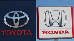 トヨタ自動車とホンダの販売店のロゴマーク＝川口雅浩撮影