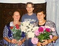 This 1985 photo provided by Manami Kushimoto shows Soviet sisters, foreground, saved by a Japanese fisherman, and the younger sister's son, center. The son was entrusted by his mother, right, to find the Japanese man who saved her life and his descendants.