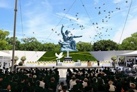 Doves are released at the Peace Park in Nagasaki on Aug. 9, 2024, during a ceremony to mark the 79th anniversary of the U.S. atomic bombing of the city. (Pool photo)