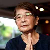 対馬丸の撃沈で弟の国吉真英さんを失った又吉正子さん。説得して疎開させたことを今も悔いている＝那覇市で2024年8月20日、喜屋武真之介撮影