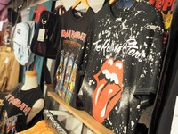 T-shirts featuring The Rolling Stones, Iron Maiden and other bands are seen at the used clothing store Furugiya Jam Harajuku in Tokyo's Shibuya Ward on Aug. 8, 2024. (Mainichi/Maki Nakajima)