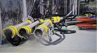Pipes to be used in extracting fuel debris from the No. 2 reactor are seen at the Fukushima Daiichi nuclear plant in Fukushima Prefecture in this photo provided by TEPCO. 
