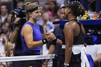 Karolina Muchova, of the Czech Republic, shakes hands with Naomi Osaka, of Japan, after winning their second round of the U.S. Open tennis championships, on Aug. 29, 2024, in New York. (AP Photo/Matt Rourke)