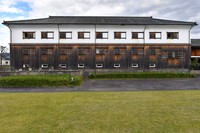 The wooden two-story sake brewery building is seen at the Hoashi Honke residence in the city of Oita on Nov. 12, 2021. The color scheme of windows that highlight the shading is beautiful. (Mainichi/Minoru Kanazawa)=Click/tap photo for more images.