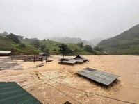 Houses are submerged in flood after typhoon Yagi hit Yen Bai province, northwestern Vietnam, on Sep. 8, 2024. (Do Tuan Anh/ VNA via AP)