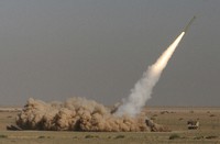 In this photo released by the Iranian semi-official Fars News Agency, the Revolutionary Guard's Fateh missile is launched in a drill near the city of Qom, 130 kilometers south of the capital Tehran, Iran, on Sept. 27, 2009. (Ali Shaigan/Fars News Agency via AP File)