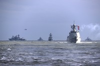 In this photo released by the Xinhua News Agency, Chinese and Russian warships take part in joint naval drills in the East China Sea on Dec. 27, 2022. (Xu Wei/Xinhua via AP, File) 
