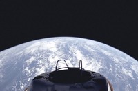 This image provided by SpaceX on Sept. 10, 2024, shows a view of Earth and the Dragon capsule's Skywalker spacewalk platform shortly after the Polaris Dawn crew launched into an orbit. (SpaceX via AP)