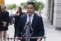 TikTok content creator Paul Tran talks to the press as he leaves the federal courthouse in Washington, on Sept. 16, 2024, after a hearing on TikTok's lawsuit against the federal government. (AP Photo/Jose Luis Magana)