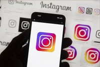 The Instagram logo is seen on a cell phone in Boston, on Oct. 14, 2022. (AP Photo/Michael Dwyer, File)