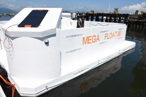 Japan firm successfully tests floating tsunami shelter carrying
