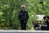 Dacia Maraini walks up the stone steps at Kosaiji temple, where she was detained during World War II, in the city of Toyota, Aichi Prefecture, on June 14, 2024. (Mainichi/Kohei Shinkai)