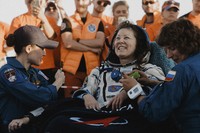 In this photo released by Roscosmos space corporation, NASA astronaut Tracy Dyson sits in a chair shortly after the landing of the Russian Soyuz MS-25 space capsule carrying herself, Roscosmos cosmonauts Oleg Kononenko and Nikolai Chub, south-east of the Kazakh town of Zhezkazgan, Kazakhstan, on Sept. 23, 2024. (Ivan Timoshenko, Roscosmos space corporation via AP)