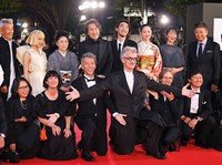 "Perfect Days" director Wim Wenders, third from right in the front row, actors Koji Yakusho and Tokio Emoto, fourth and fifth from left respectively in the back row, and other guests are seen on the red carpet at the 36th Tokyo International Film Festival, in Tokyo's Chiyoda Ward on Oct. 23, 2023. (Mainichi/Ririko Maeda)