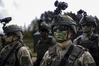Lithuanian Army soldiers take part in a Lithuanian-Polish Brave Griffin 24/II military exercise near the Suwalki Gap near the Polish border at the Dirmiskes village, in Lithuania on April 26, 2024. (AP Photo/Mindaugas Kulbis, File)