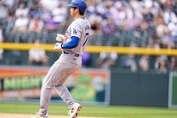 Los Angeles Dodgers' Shohei Ohtani pulls in to second base on a double steal in the eighth inning of a baseball game against the Colorado Rockies, on Sept. 29, 2024, in Denver. (AP Photo/David Zalubowski)