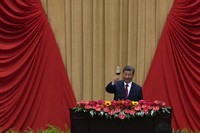 Chinese President Xi Jinping makes a toast on stage after delivering his speech at a dinner marking the 75th anniversary of the founding of the People's Republic of China, at the Great Hall of the People in Beijing, on Sept. 30, 2024. (AP Photo/Andy Wong)