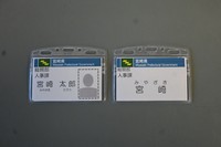 A sample of a name tag previously used by prefectural government employees, left, and the current one displaying just the department and last name, right, are seen at Miyazaki Prefectural Government headquarters on Oct. 1, 2024. (Mainichi/Kazuhito Shimozono)