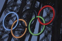 A general view of the Olympic rings displayed on the Eiffel Tower is pictured during the opening ceremony for the 2024 Summer Olympic Games. (Nir Elias/Pool Photo via AP, File)
