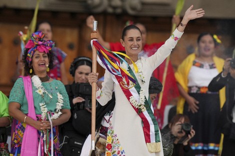 President Claudia Sheinbaum waves to supporters in the Zocalo, Mexico City's main square, during a rally on her inauguration day, on Oct. 1, 2024. (AP Photo/Fernando Llano)