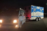 石川県珠洲市からの依頼を受け、現地に向かう「災害派遣トイレネットワーク」の静岡県富士市のトイレトレーラー＝9月23日（一般社団法人「助けあいジャパン」提供）