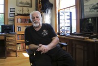 Paul Watson, founder of the Sea Shepherd Conservation Society, made famous by the television show "Whale Wars", talks with media at his home office in Woodstock, Vt. on Aug. 23, 2016. (AP Photo/Lisa Rathke, File)