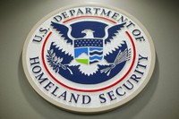 The Department of Homeland Security logo is seen during a news conference in Washington, Feb. 25, 2015. (AP Photo/Pablo Martinez Monsivais, File)