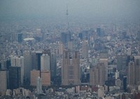 Skyscrapers in Tokyo's Shinjuku Ward are seen from a Mainichi Shimbun helicopter in April 2020. The building seen in the center is the Tokyo Metropolitan Government headquarters. (Mainichi)