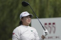 Mao Saigo of Japan watches her tee shot on the 4rd hole during the third round of the LPGA Shanghai at Shanghai Qizhong Garden Golf Club in Shanghai, China, on Oct. 12, 2024. (AP Photo/Achmad Ibrahim)