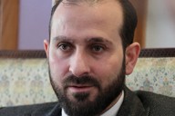 インタビューに応じるシリア暫定政権のムハンマド・オマル情報相＝シリア・ダマスカスで2024年12月17日、和田大典撮影