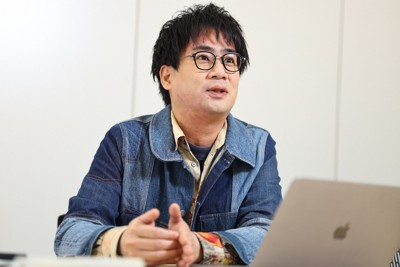 これまでの歩みを語る「事務員G」さん＝東京都港区で2024年11月27日、玉城達郎撮影