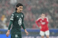 Monaco's Takumi Minamino reacts during a Champions League playoff second leg soccer match between SL Benfica and AS Monaco at the Luz stadium in Lisbon, on Feb. 18, 2025. (AP Photo/Armando Franca)