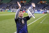 Japan's head coach Hajime Moriyasu acknowledges the applause from the crowd after his team's win against Bahrain in their World Cup qualifying soccer match at Saitama Stadium in Saitama, Japan, on March 20, 2025. (AP Photo/Eugene Hoshiko) 