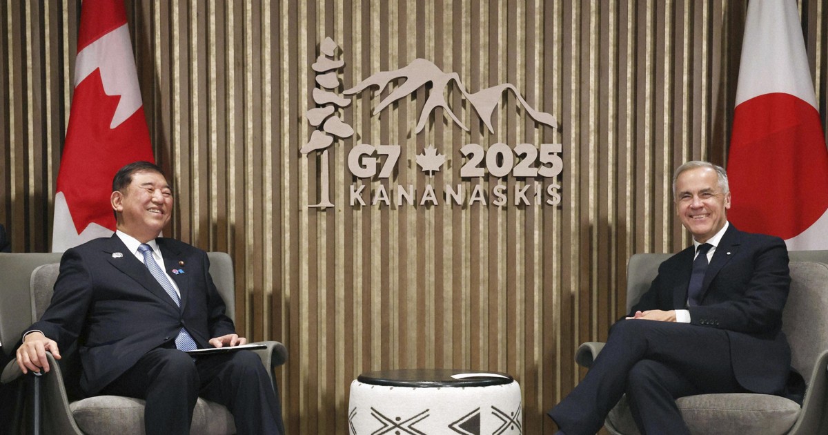Japan, Canada leaders discuss uncertain economy, trade