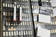 沖縄県読谷村の村史編集室の引き出しに保管されている沖縄戦の証言テープ＝同村で2025年5月23日午後2時10分、比嘉洋撮影