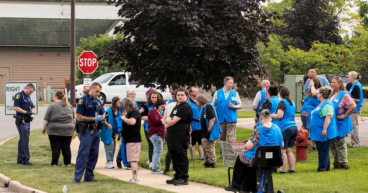 A man accused of stabbing 11 people at a Walmart is in Michigan authorities' custody