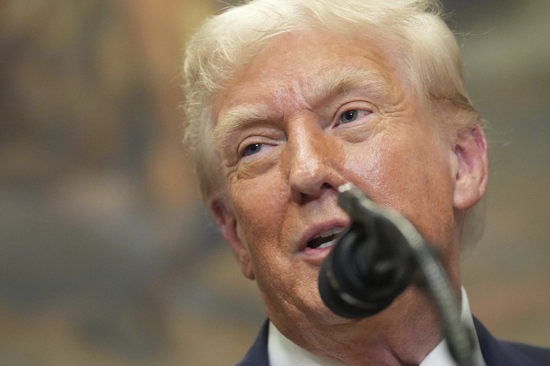 ホワイトハウスで演説するトランプ米大統領＝ワシントンで2025年7月31日、AP